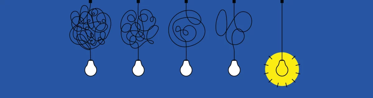 5 skizzierte Glühbirnen, 1 leuchtet auf